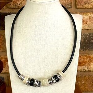 Vintage stone, metal and rhinestone beaded charms on black leather necklace
